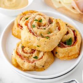 angled shot of plate of four pinwheels