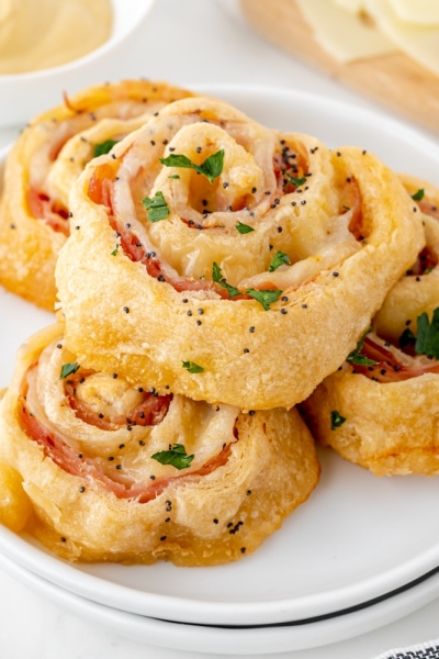 angled shot of plate of four pinwheels
