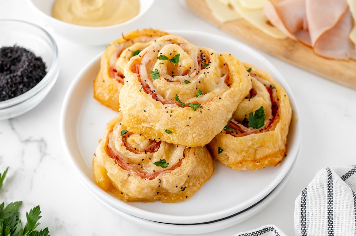 angled shot of plate of four pinwheels