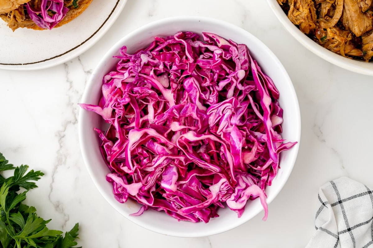 overhead shot of red cabbage slaw in bowl