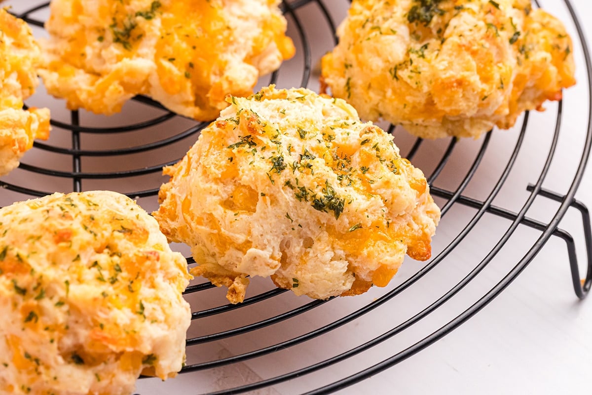 cheddar bay biscuits on a cooling rack