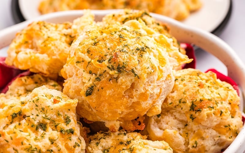 close up of basket of cheddar bay biscuits