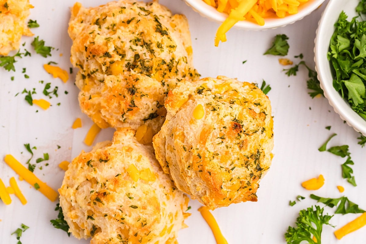 overhead shot of three red lobster biscuits