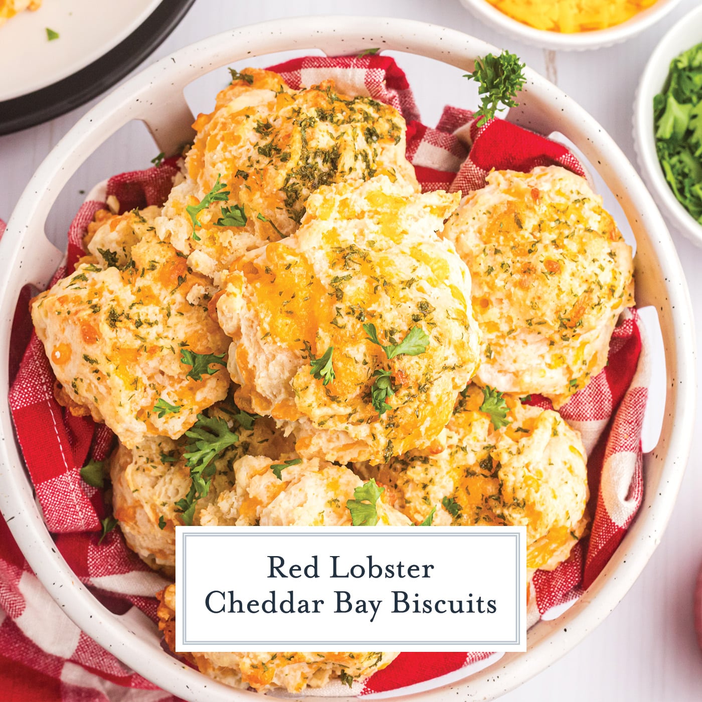 overhead shot of basket of red lobster biscuits with text overlay for facebook