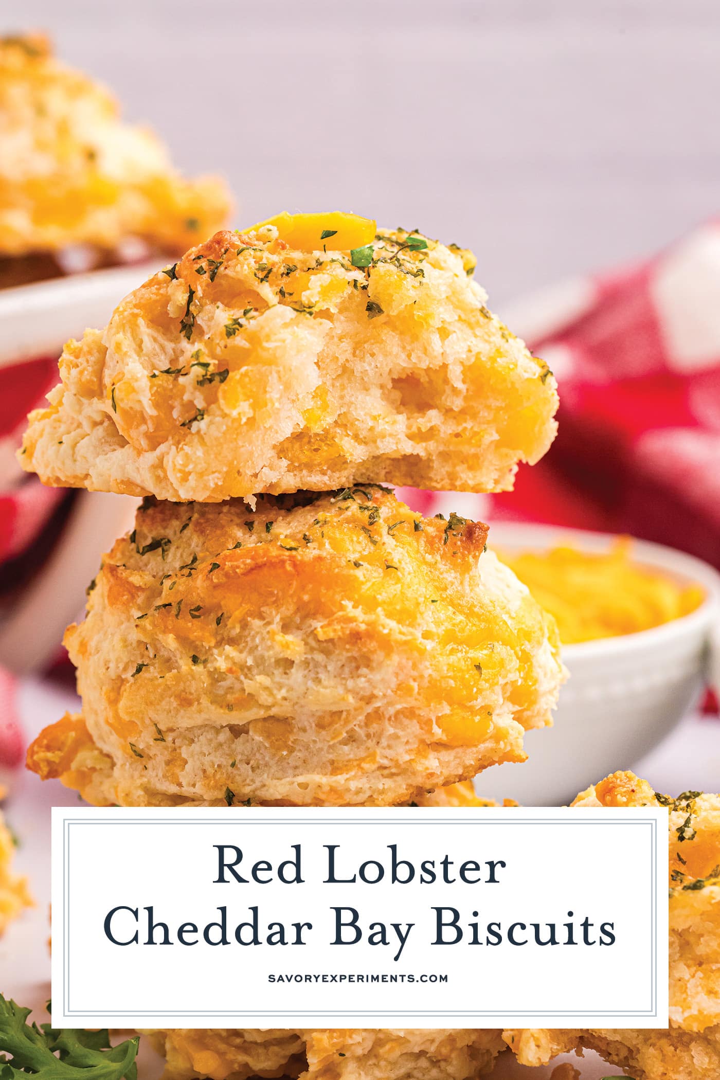straight on shot of stack of red lobster biscuits with text overlay for pinterest