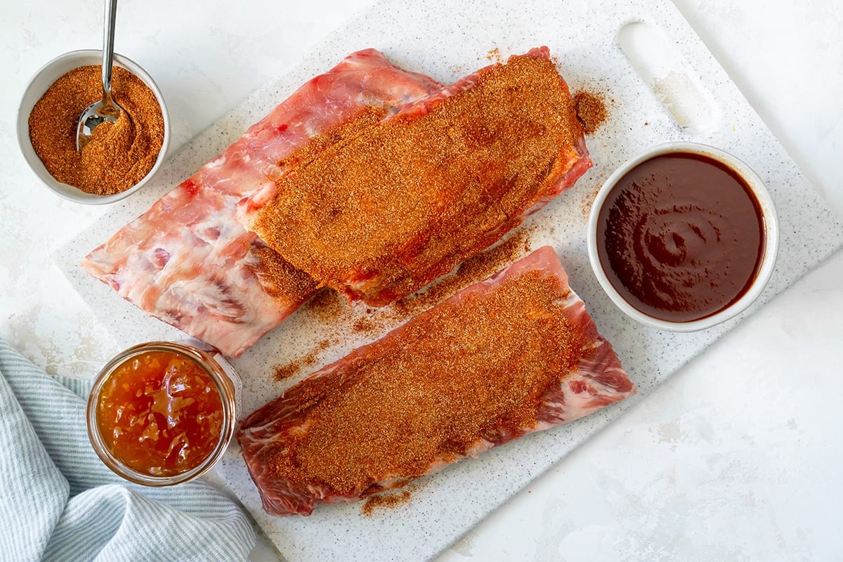 overhead shot of ribs rubbed with seasoning