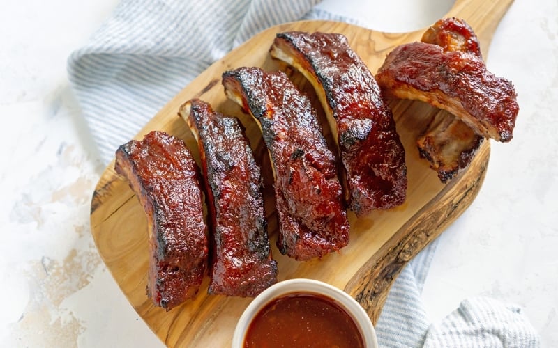 baby back ribs on a cutting board