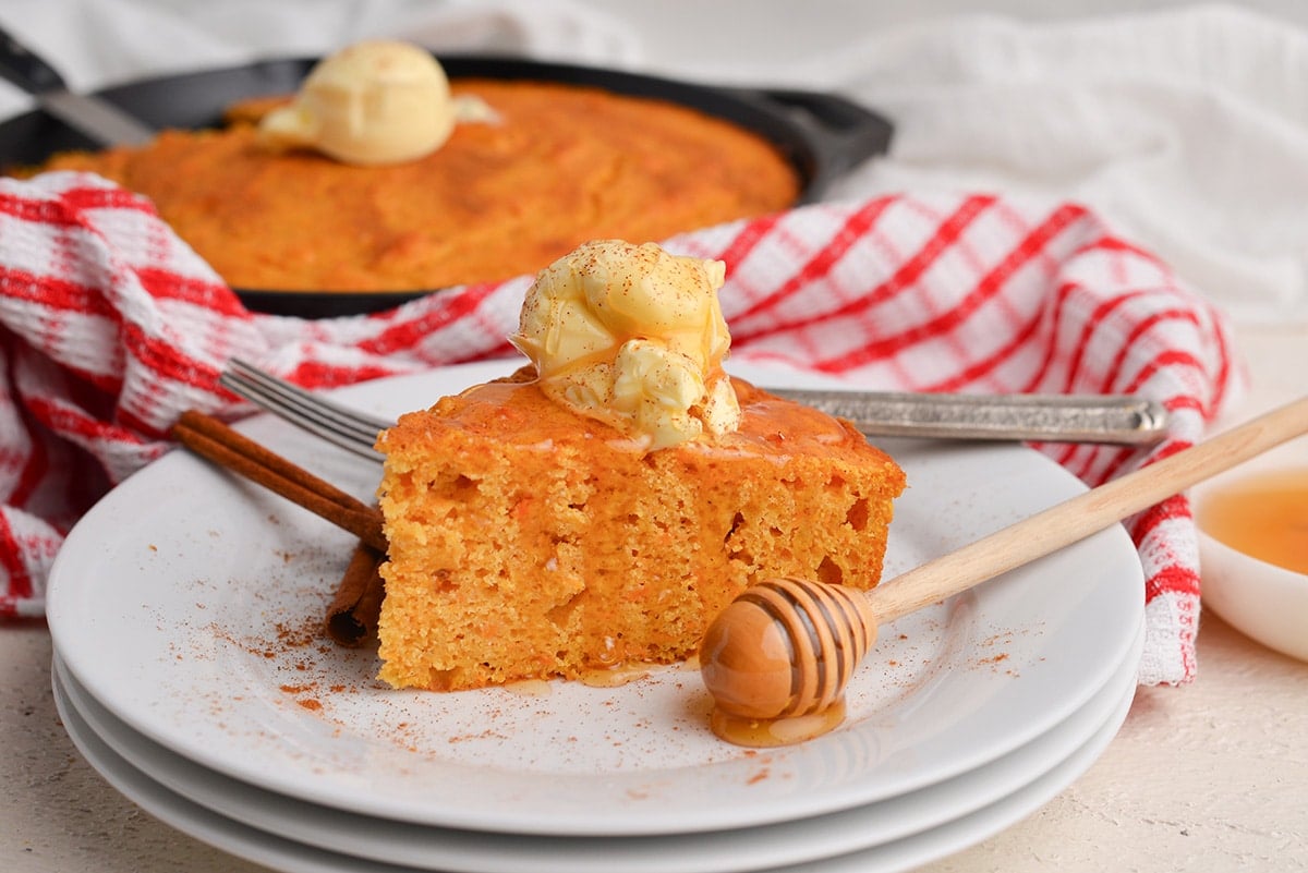 angled shot of slice of cornbread on plate