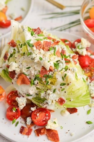 shot of toppings on wedge salad