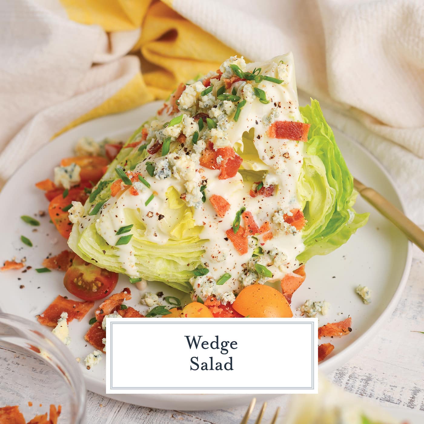 angled shot of wedge salad on white plate with text overlay for facebook