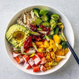 overhead shot of california roll rice bowl