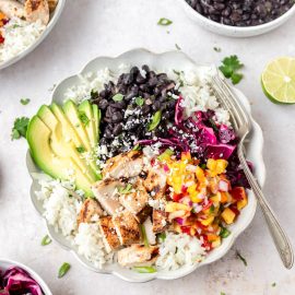 overhead shot of grilled chicken burrito bowls