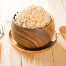 wooden bowl of cooked brown rice