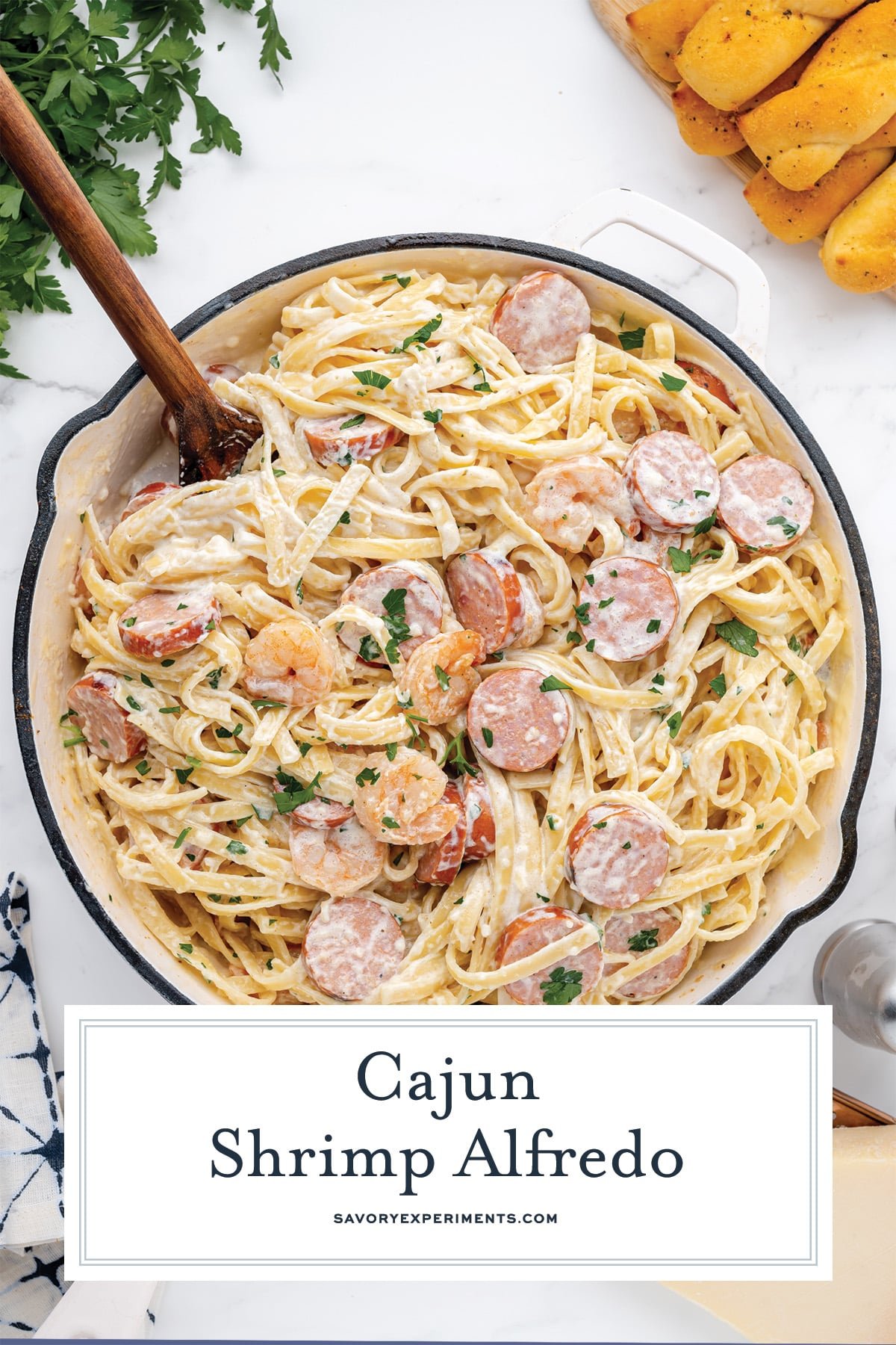 overhead image of cajun shrimp alfredo with text overlay