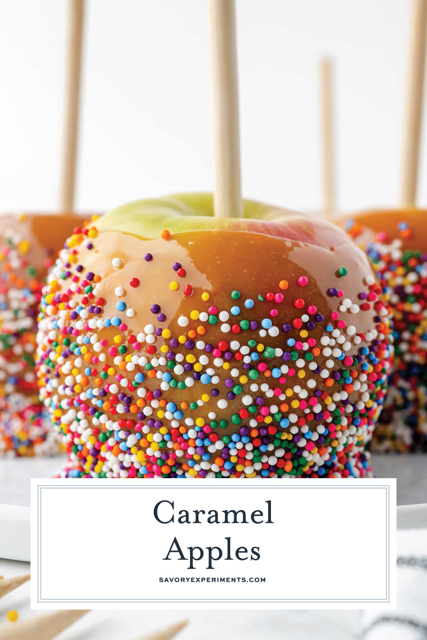 straight on shot of caramel apple with text overlay for pinterest