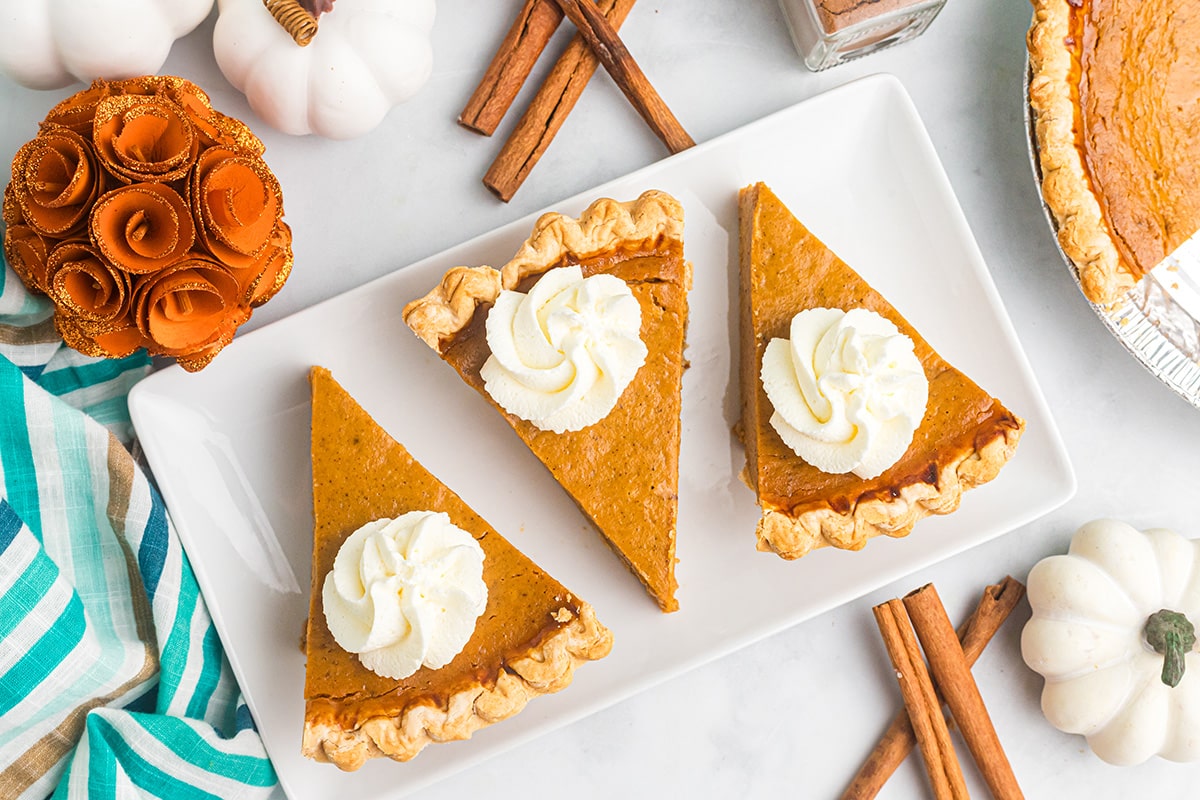 overhead shot of 3 slices of easy pumpkin pie on platter