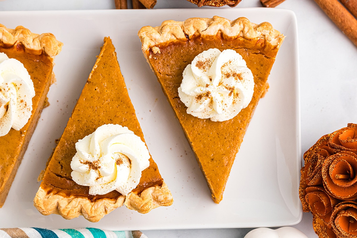 overhead shot of two slices of pie on a plate