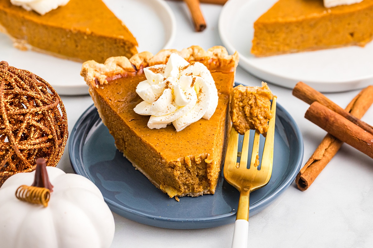 bite taken out of slice of easy pumpkin pie