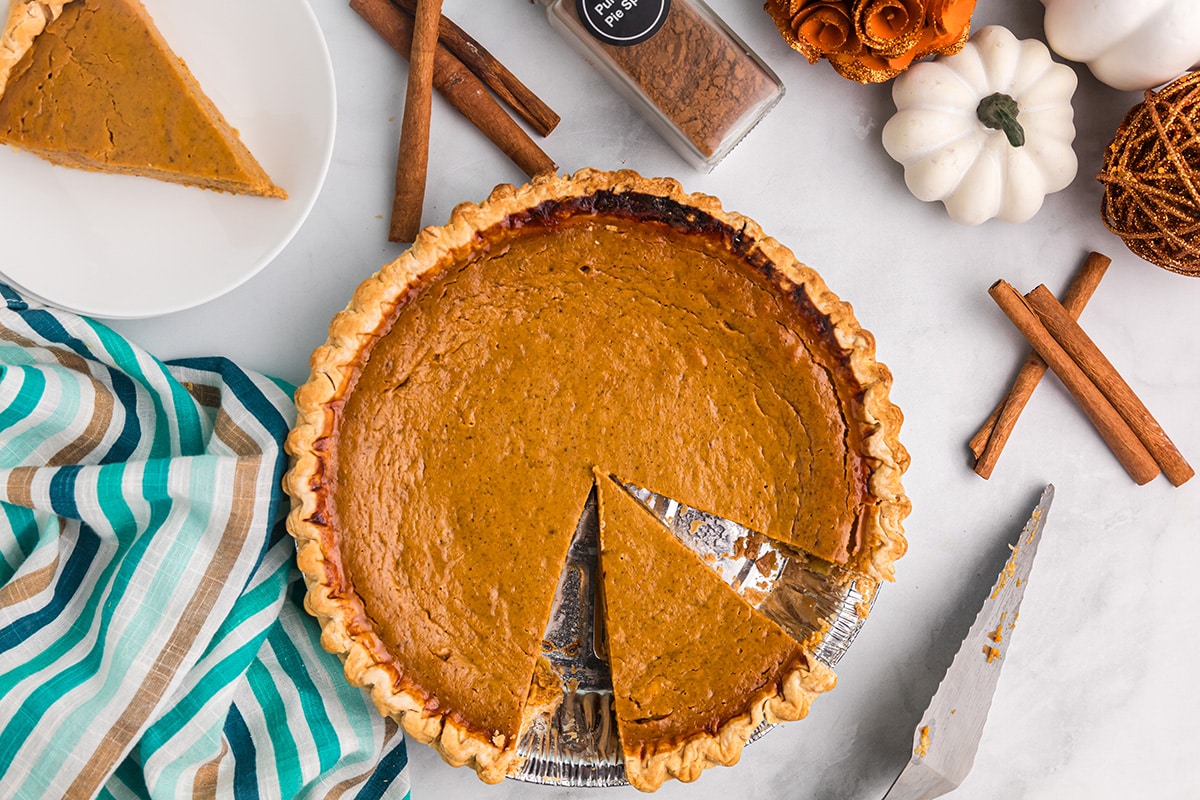 overhead shot of slice taken out of easy pumpkin pie