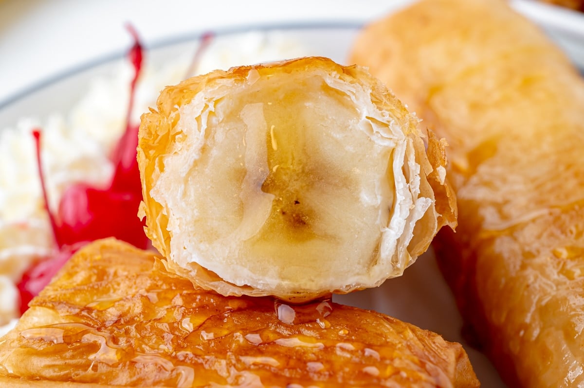 close up of fried banana cut in half