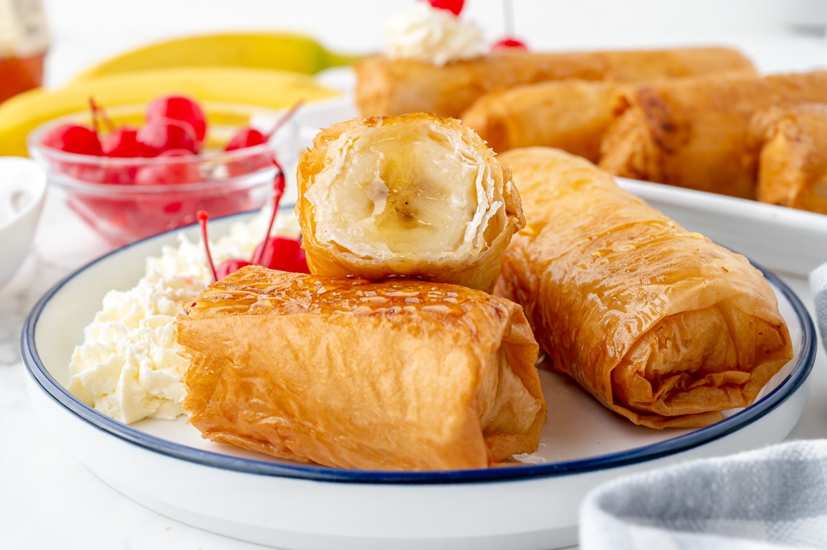 fried banana cut in half on plate