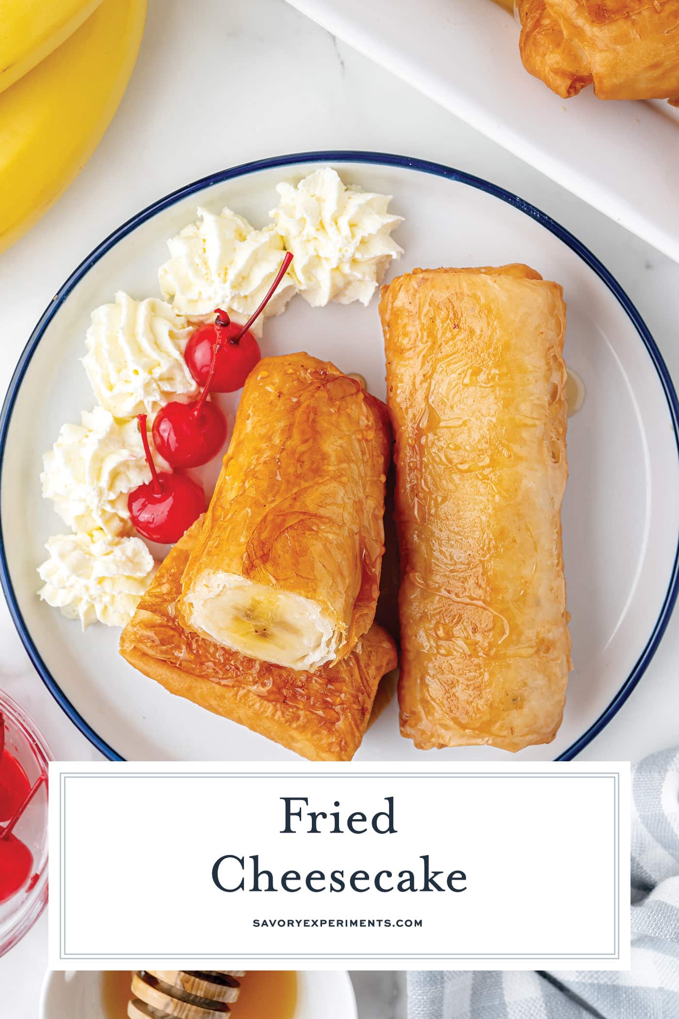 overhead shot of fried cheesecake on plate with text overlay for pinterest