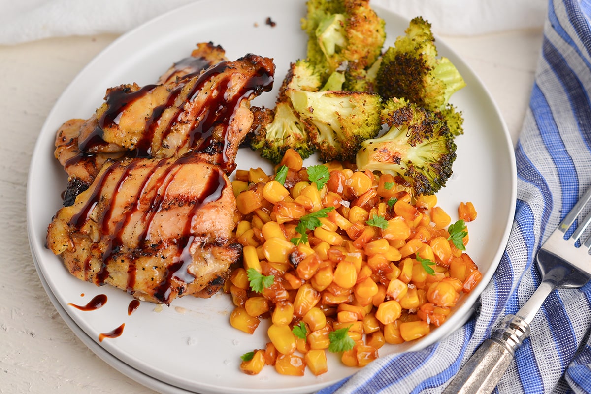 angled shot of southern fried corn on plate with chicken and broccoli