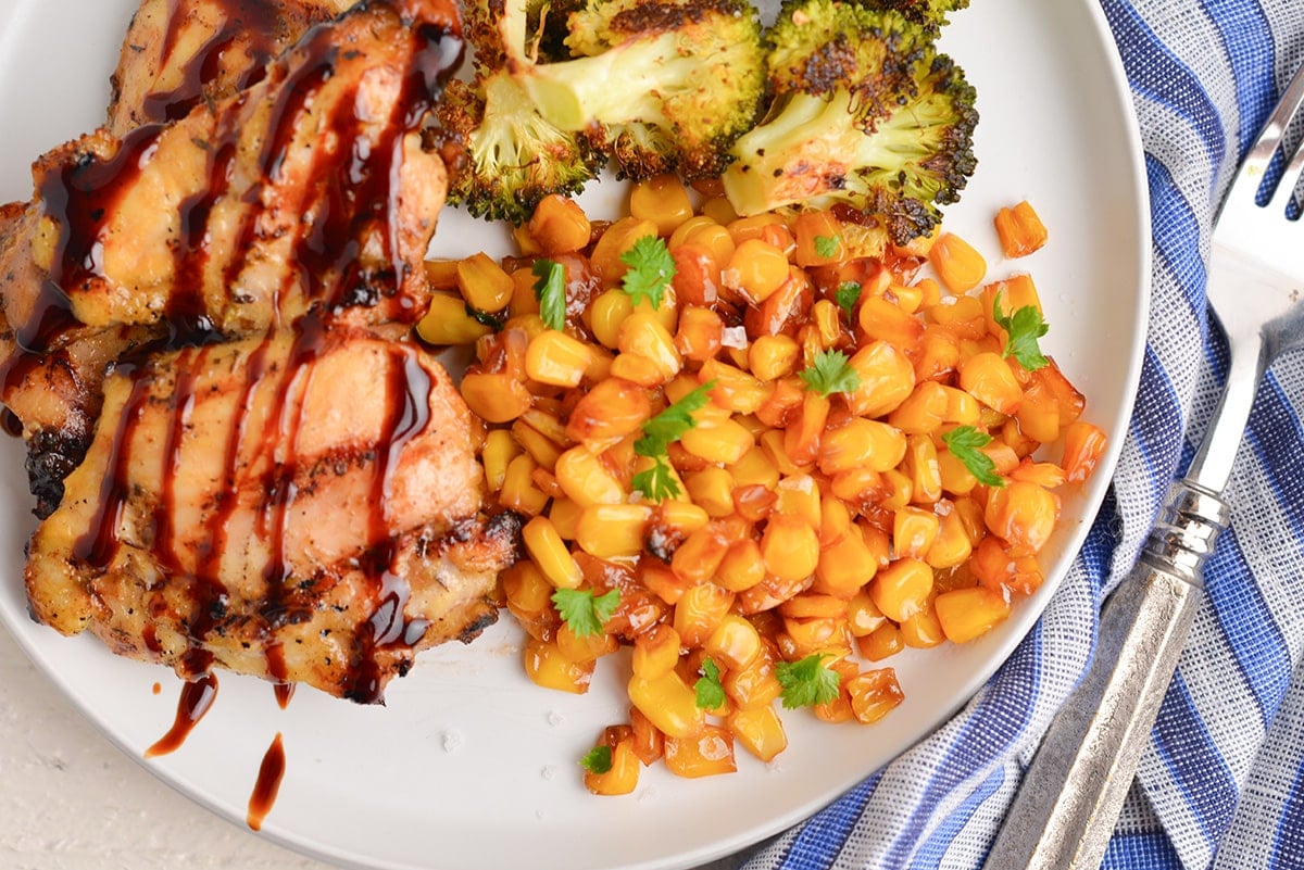 overhead shot of southern fried corn on plate with chicken and broccoli