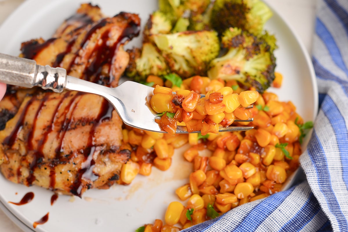 close up of bite of corn on fork