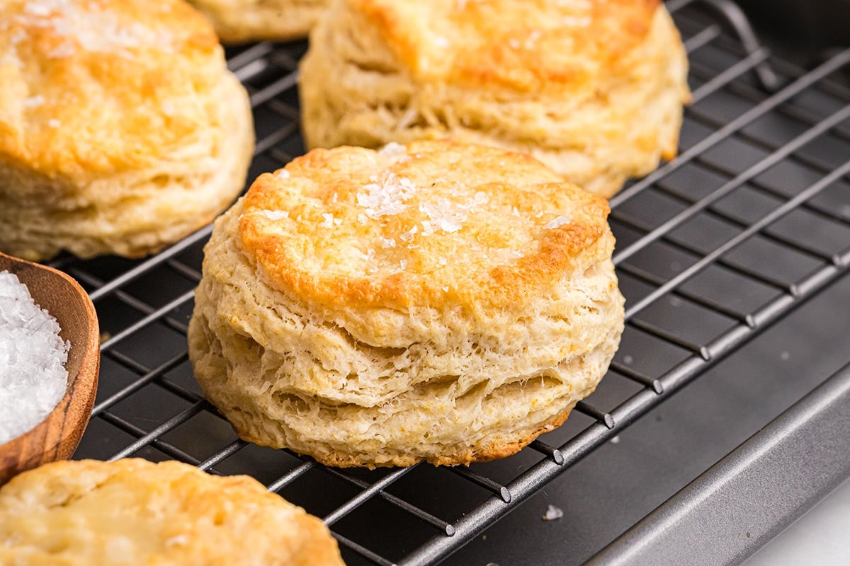 close up of a biscuit on a wire cooling rack