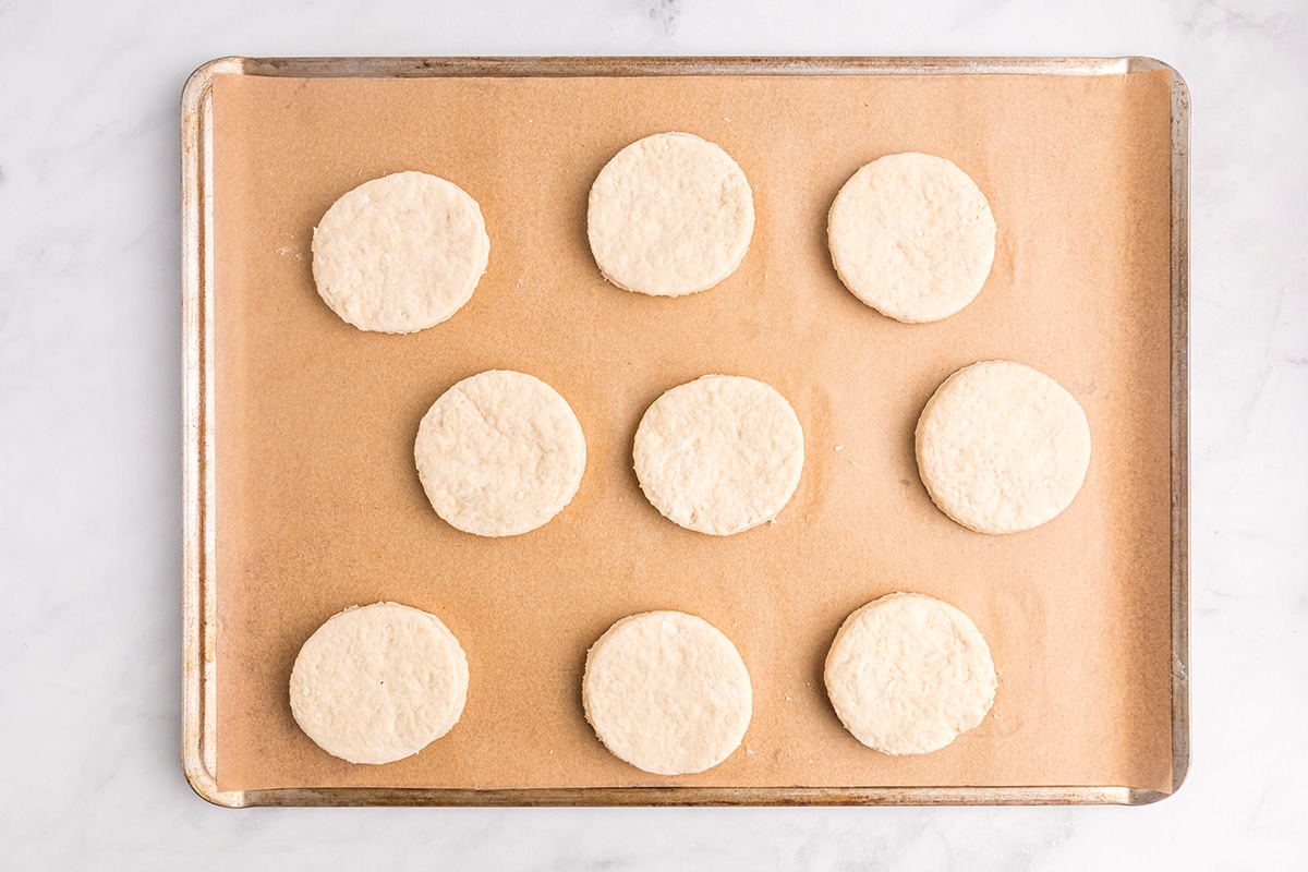 biscuit dough on a parchment lined baking sheet