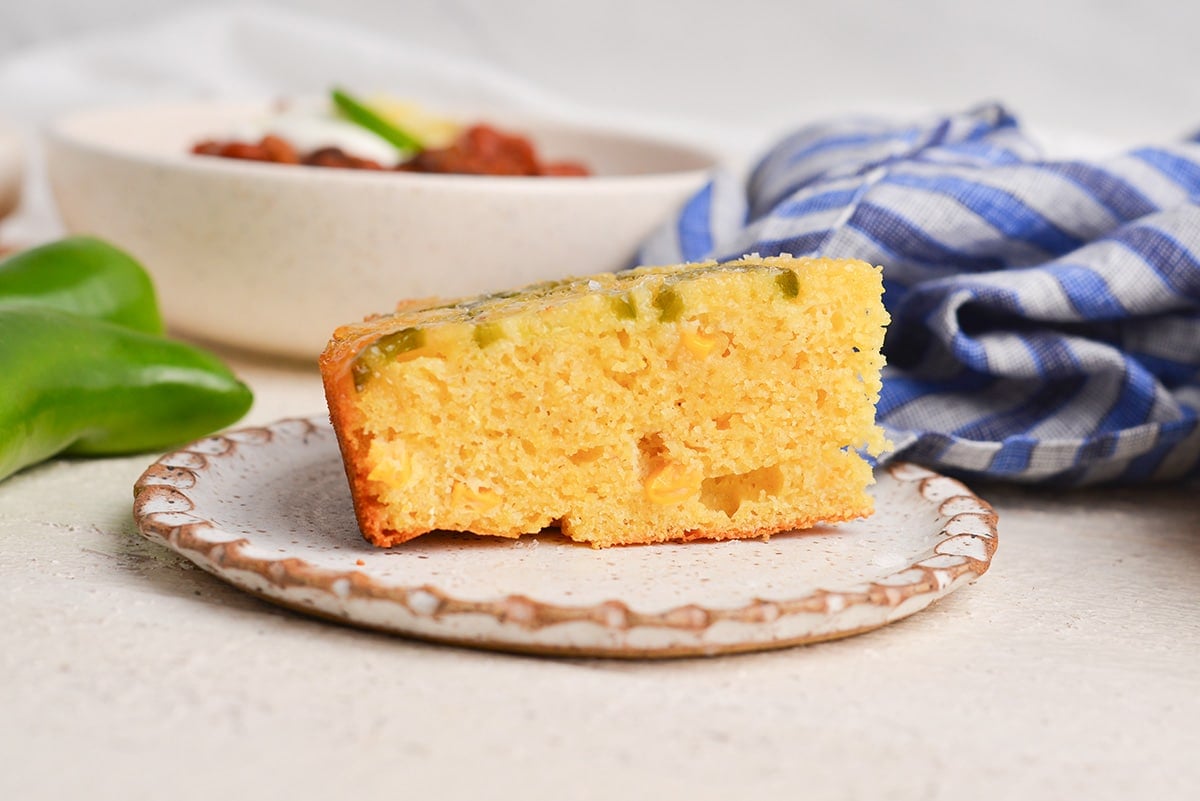 close straight on shot of slice of jalapeno cornbread