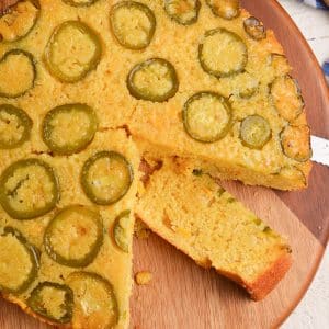 overhead shot of slice taken out of honey jalapeno cornbread