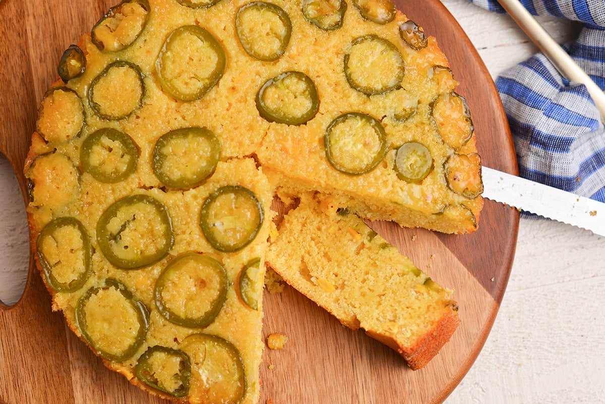 overhead shot of slice taken out of honey jalapeno cornbread