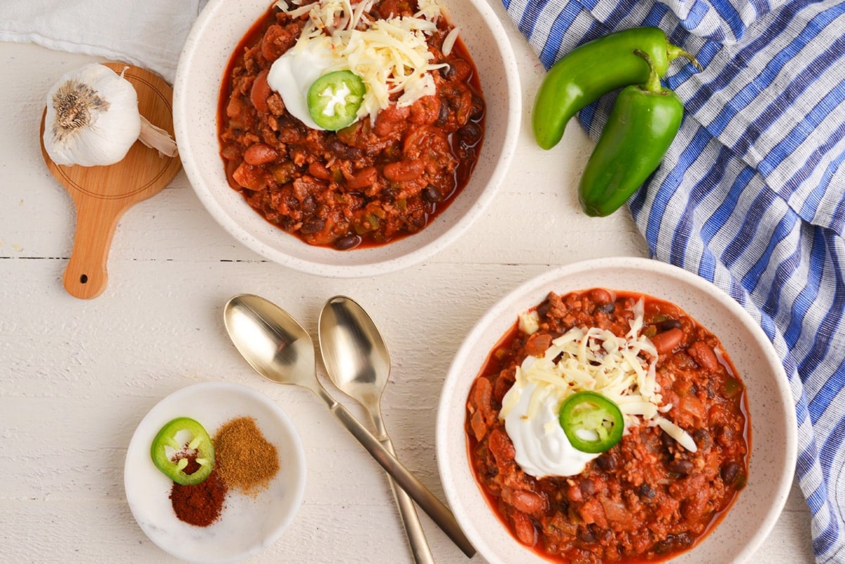 overhead shot of two bowls of chili