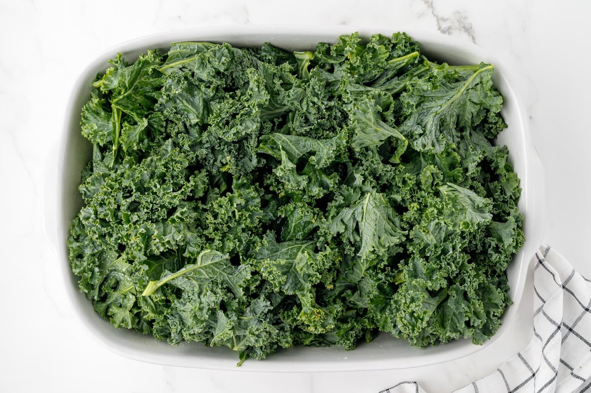 raw kale in baking dish