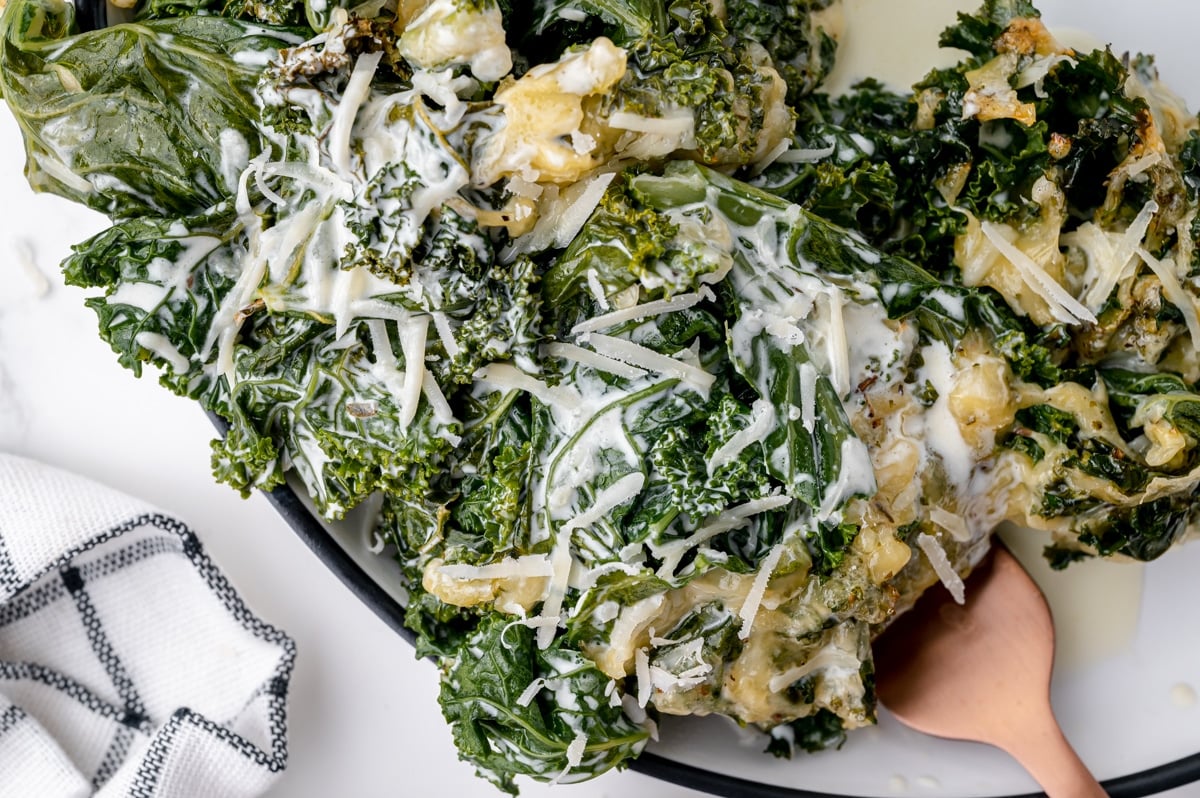 close up overhead shot of kale gratin on fork