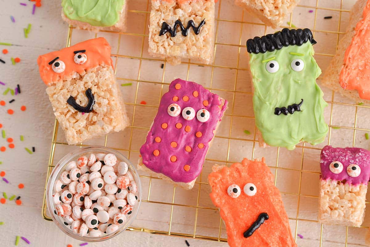 overhead shot of monster rice krispie treats with bowl of eyes