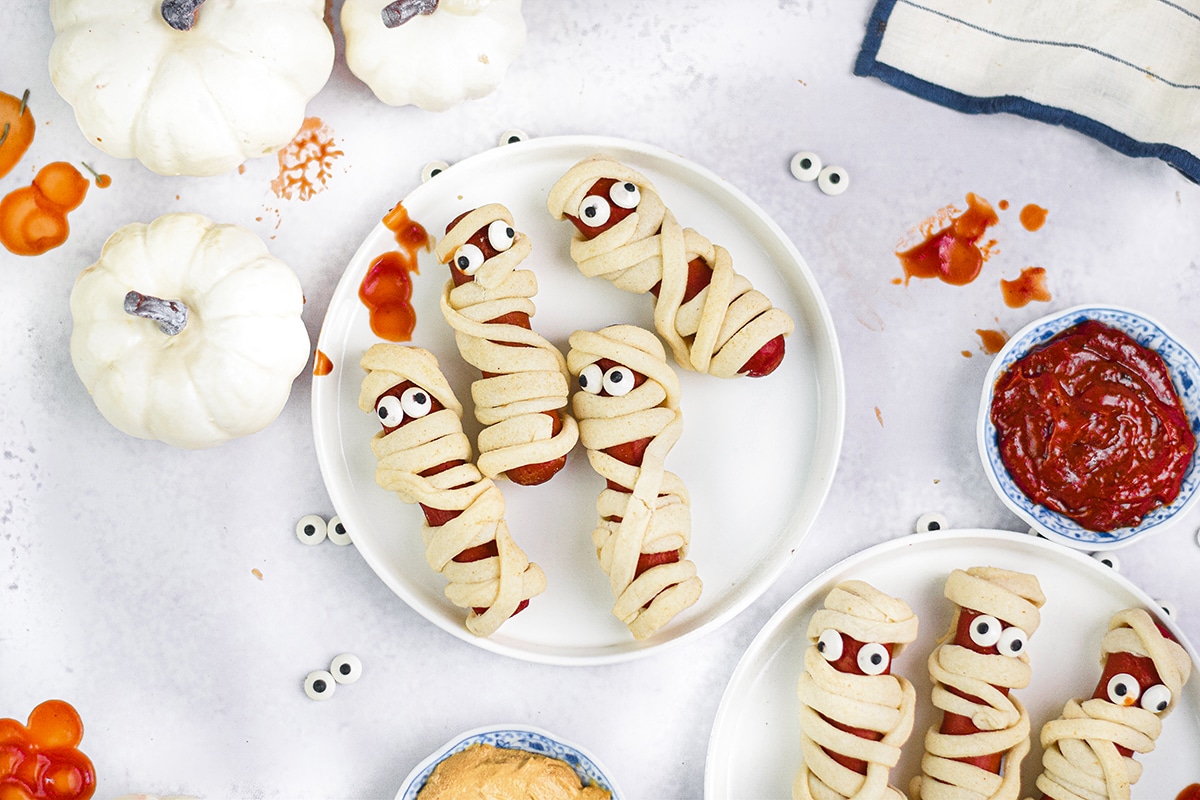 overhead shot of plate of hot dog mummies