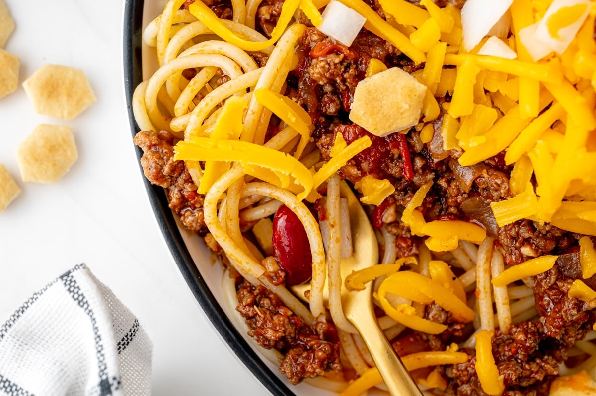 close up of fork in bowl of Cincinnati chili