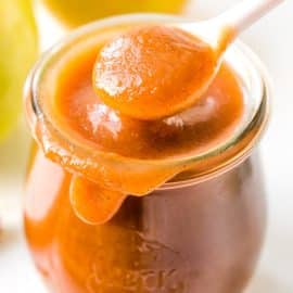 spoon in jar of apple butter