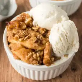 angled shot of slow cooker apple crisp