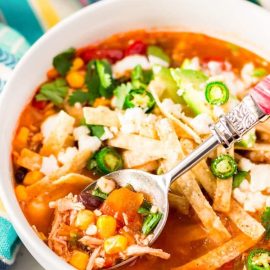 spoon in bowl of chicken tortilla soup