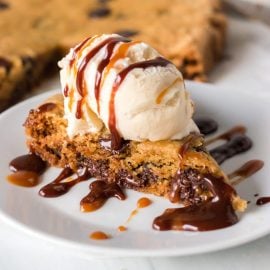 slice of chocolate chip cookie cake on plate