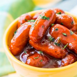 angled shot of bowl of little smokies