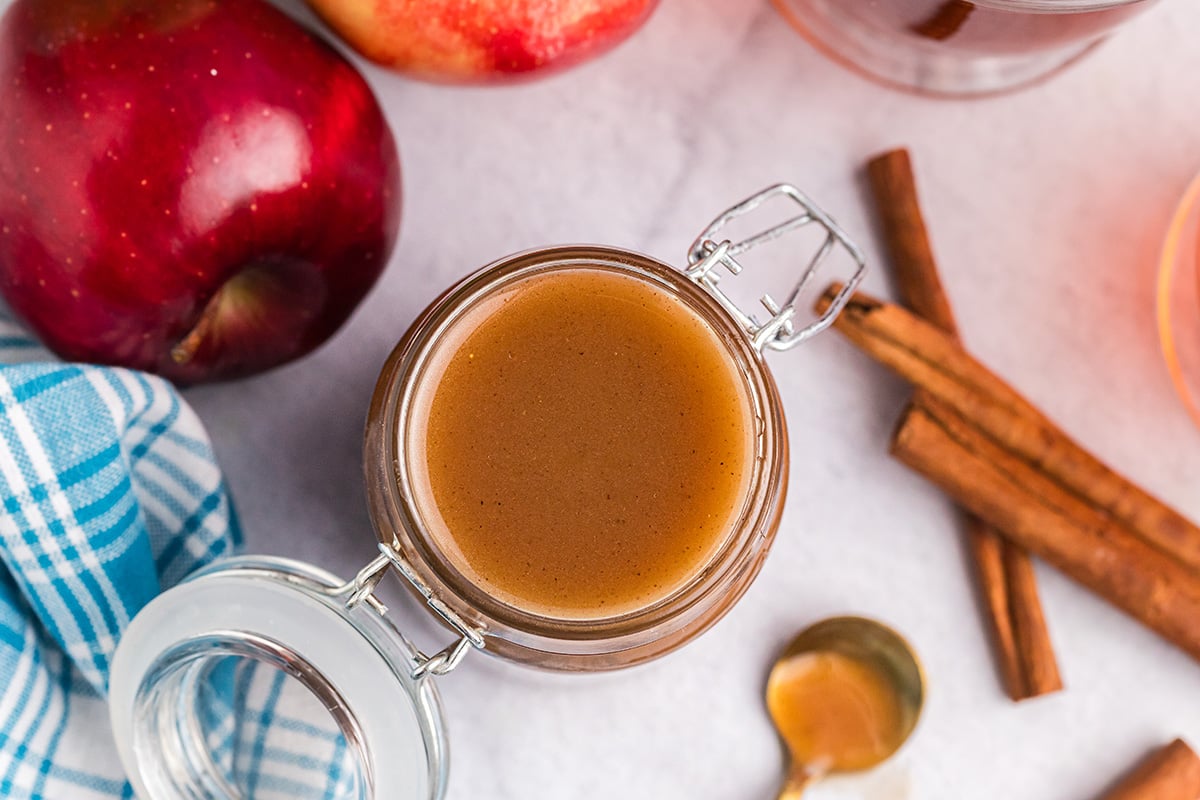 overhead shot of jar of apple cider syrup