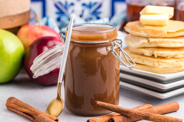 straight on shot of jar of apple cider syrup