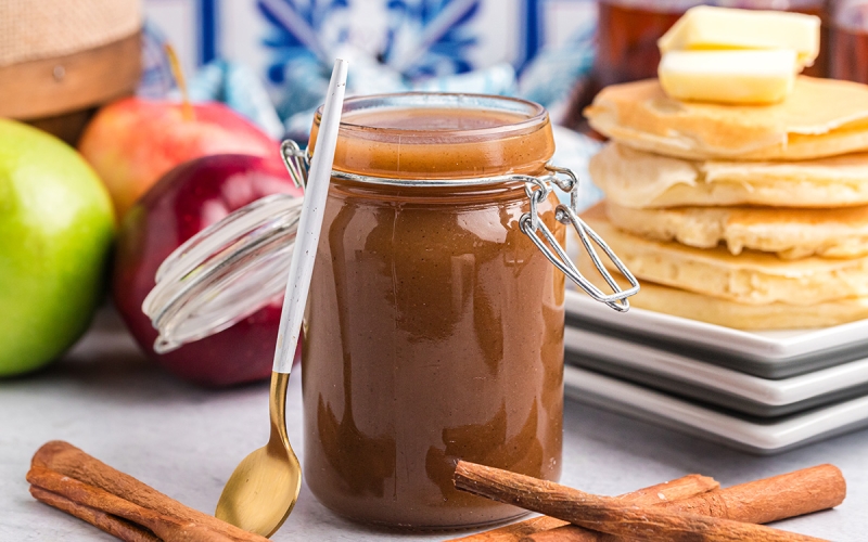 straight on shot of jar of apple cider syrup