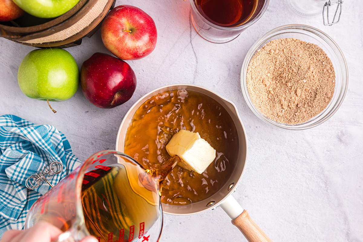 apple cider poured into pan