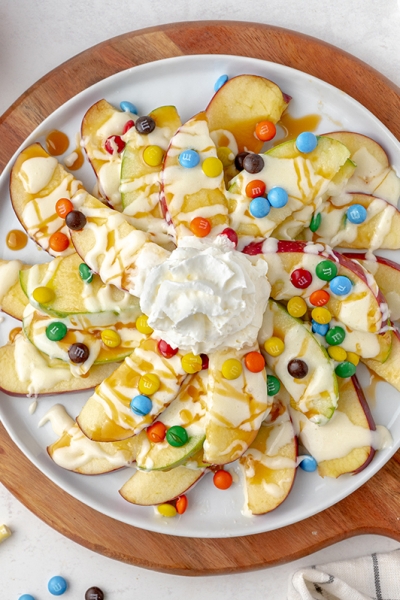 overhead hero of apple nachos recipe using red and green apples